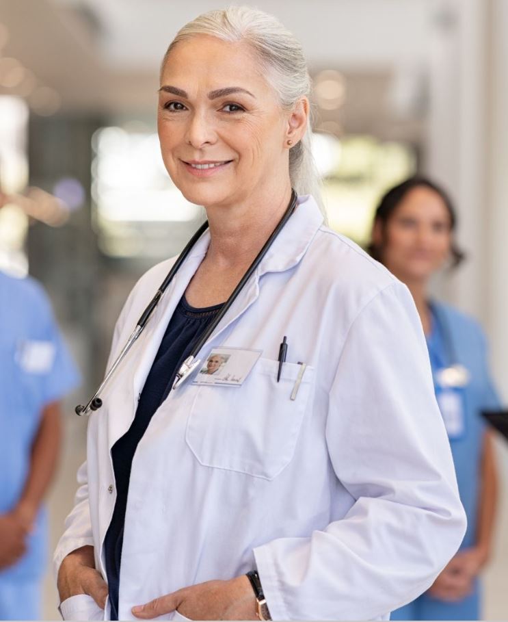 Medical professional analyzing tax reduction and medical practice investment metrics layout