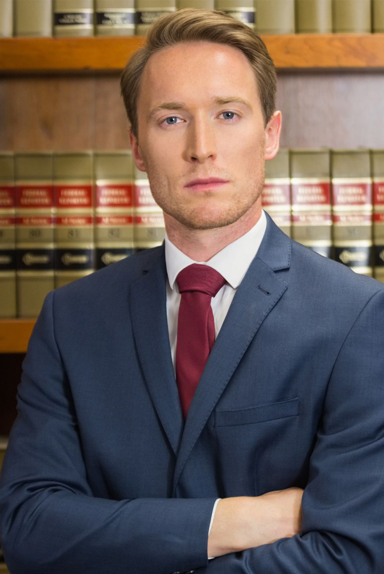 Legal professional analyzing tax reduction and law firm partnership investment metrics layout