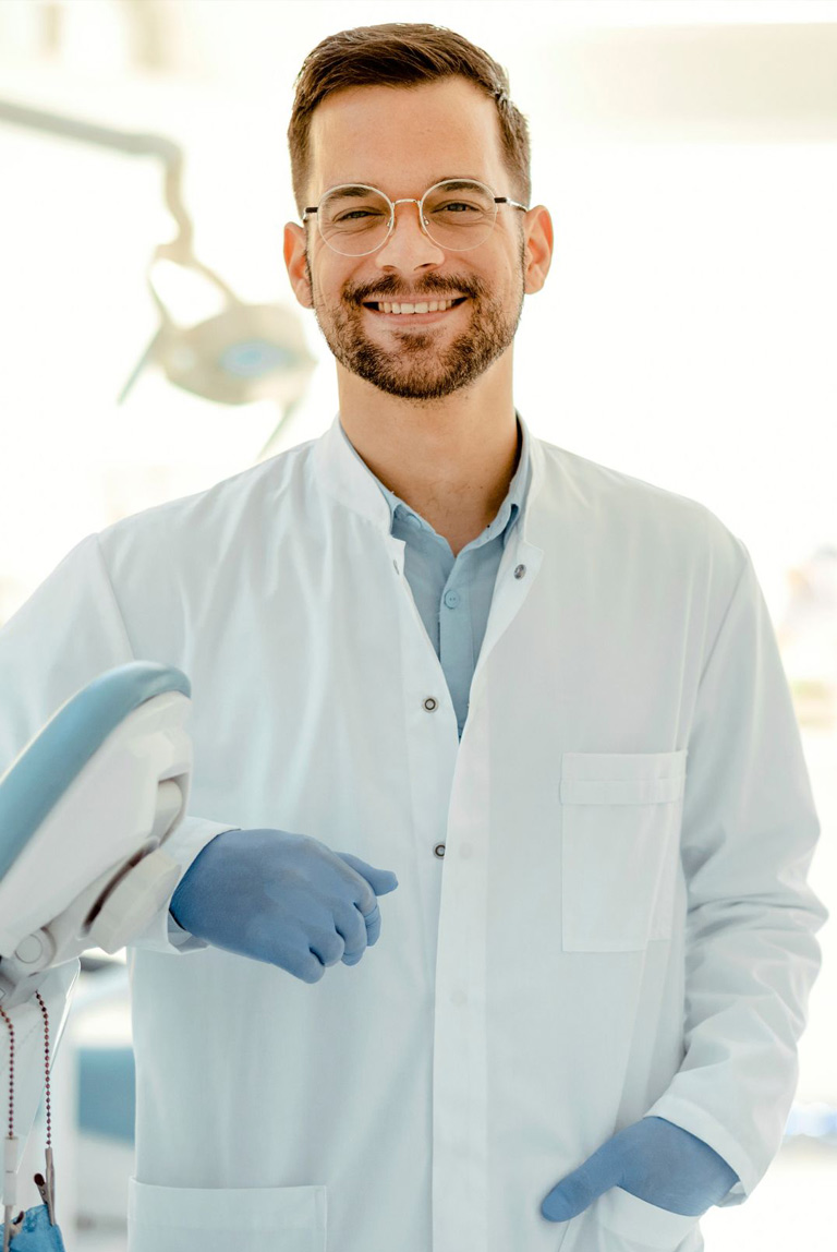 Dental professional analyzing tax reduction and practice acquisition investment metrics layout